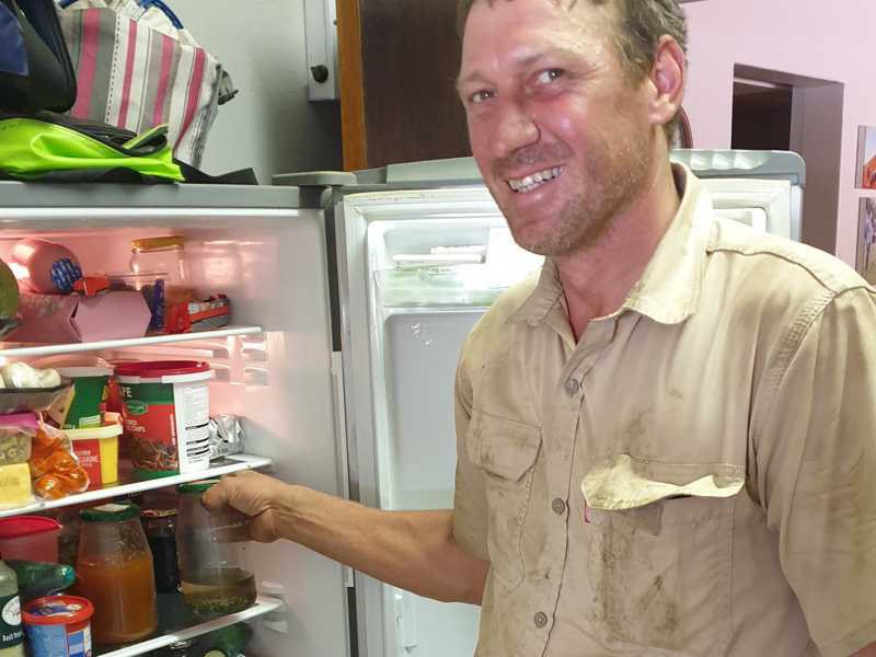 A glass of chilled Cancer Bush tea in everyday farm life – ready for the next break.
